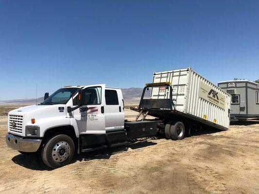 20' containers delivered with our own tow truck for easy maneuverability and placement.