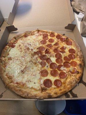 Half pepperoni half cheese pizza