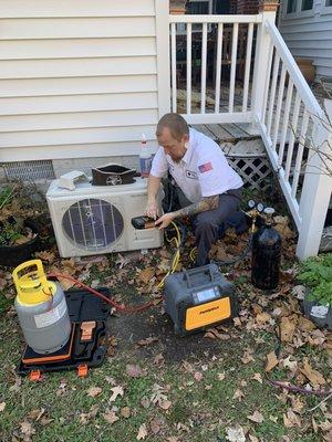 Bryan fixing a mini split ac