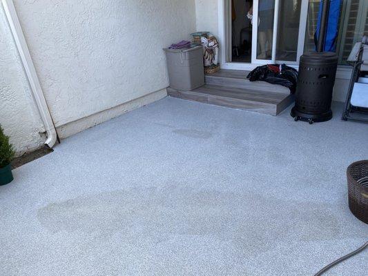 The section of my $7000 coated concrete patio that is immediately off the kitchen.