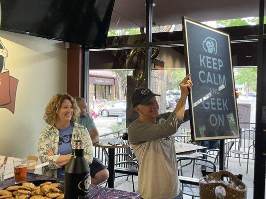 As the poster says: Keep calm and geek on. (From our 20th Anniversary party)