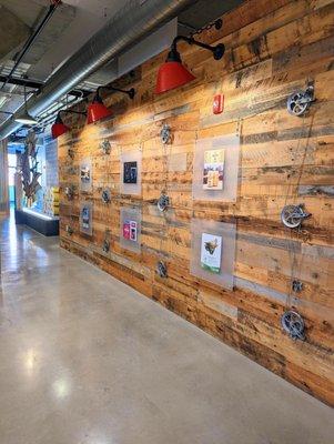 Wall of recognized projects and campaigns at the AdFarm office in Kansas City