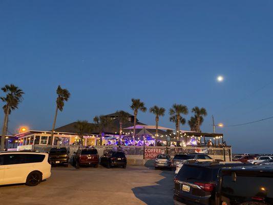 From the parking lot facing the Andy D's deck with live music.