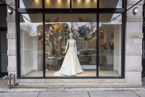 Brideside Bride wedding dress in window