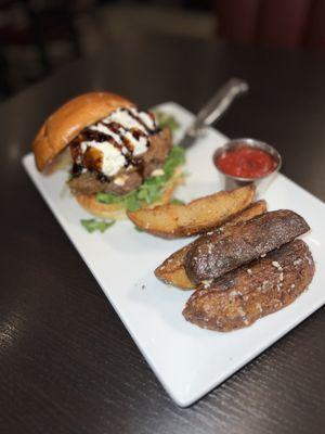 Grass Fed Burger and potato steak fries that are really wedges and superb ones at that.