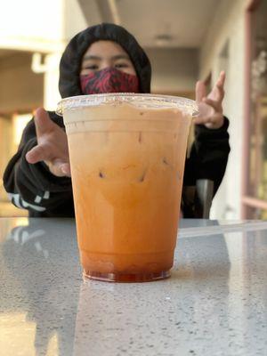 Excited about his Thai iced tea