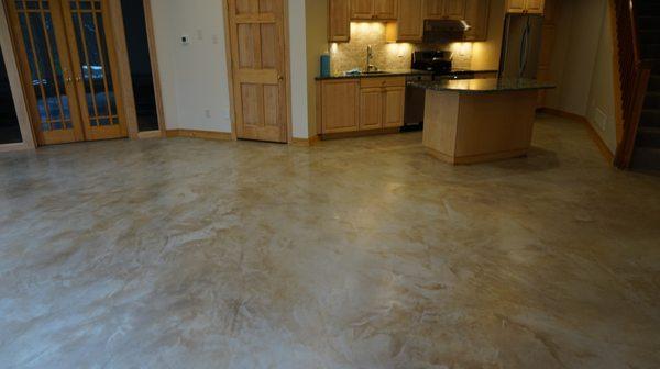 Stained concrete overlay gives old floors a new look.