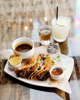 Taco Tuesday Special: short rib birria tacos served with consomme