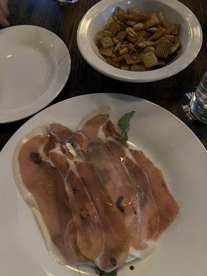 Prosciutto & Burrata (bottom), Chex mix with truffle (top)