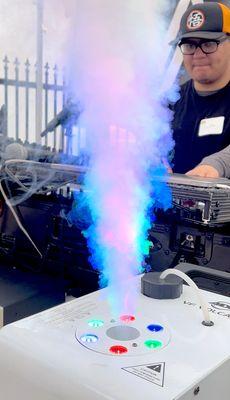 For outdoor events, we do take two vertical fog machines for added visual effects.