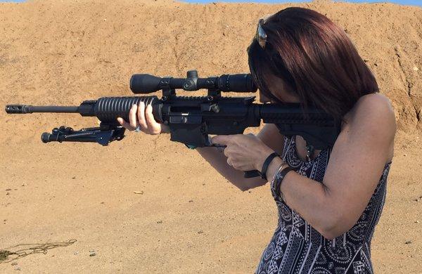 Learning to shoot a .308 caliber rifle.