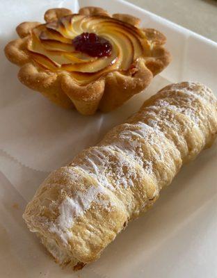 Raspberry cheesecake and a vanilla eclair