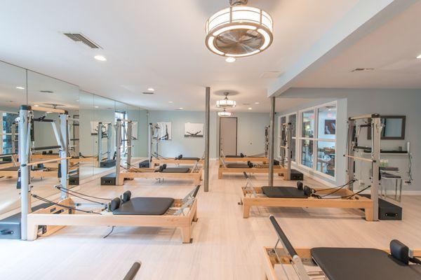 Group Pilates classes are held in this spacious studio.