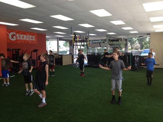 Kids training in one of their sports performance classes!