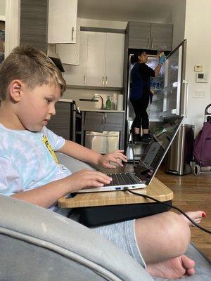 This is my son relaxing while a cleaning genius got the bad smell out of our new fridge!!