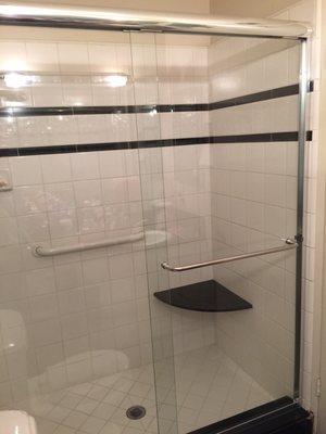 Chrome framed shower bypass doors.