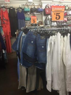 Look for the clearance racks (there's a couple of them) usually have good deals.