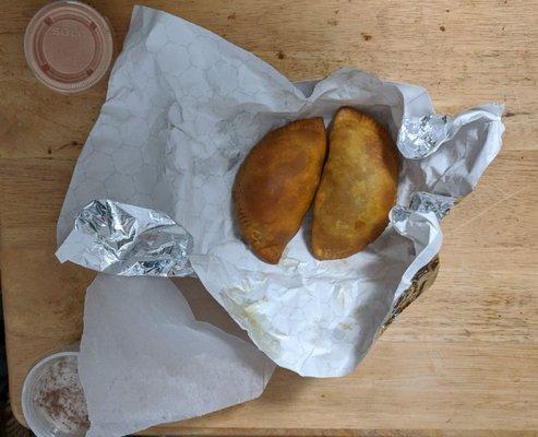 Empanadillas. Little empanadas, lots of juicy stuffing! Eat with napkins, but worth it.