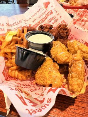 12 piece boneless wings with curly fries