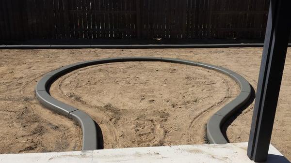 6x4 flat curbing horse shoe shape. Inner part will have pavers installed. Before picture