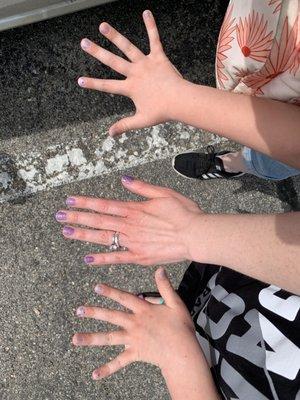 Silver polish with giant sparkles and purple sparkle nails