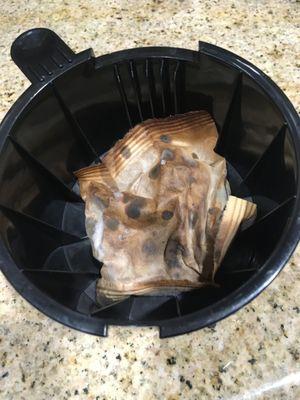 Moldy coffee packet in pot