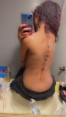 Spine tattoo