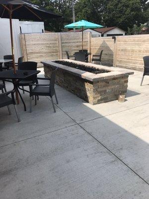 Nice outdoor patio w TVs and fireplace