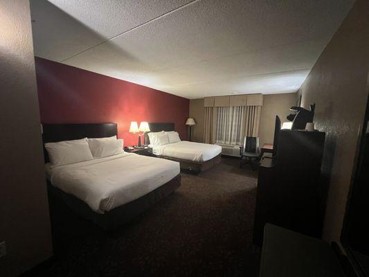 Spacious Room, Plenty of Outlets, Thick Pillows, Clean, Soft White Lines, Comfortable Mattresses.