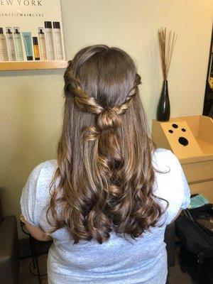 One of our wonderful clients was invited to her best friends wedding, so she stopped by for a braided style.