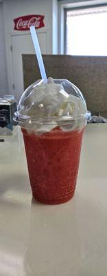 The "Princess Peach" drink: red cream soda with peach puree and whipped cream.