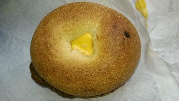 Steak, egg and cheese bagel top view.