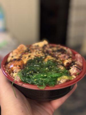 Poke Bowl with Hawaiian Style and Spicy Ahi. Ocean Grass and Furikake seasonings topped with Terriyaki.