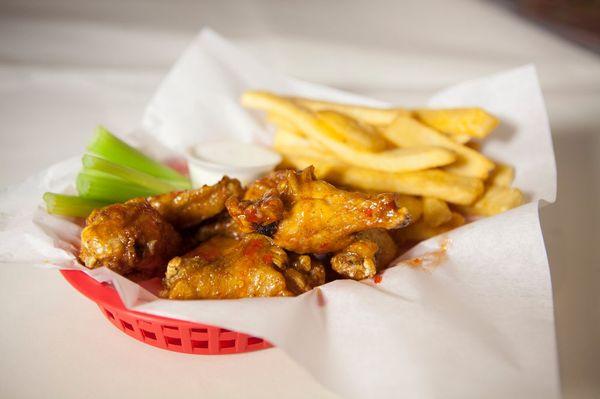 Jumbo chicken wings and fries.