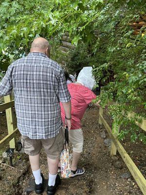 Elderly couple trying to get down the steps that were conveniently left out of picture of cabin on website.