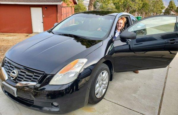 Miranda in her "new" car!