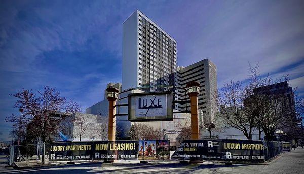 Looking at the plaza area of Reno City Center with apartment towers in the background.