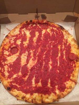 Cheese pizza with half pepperoni