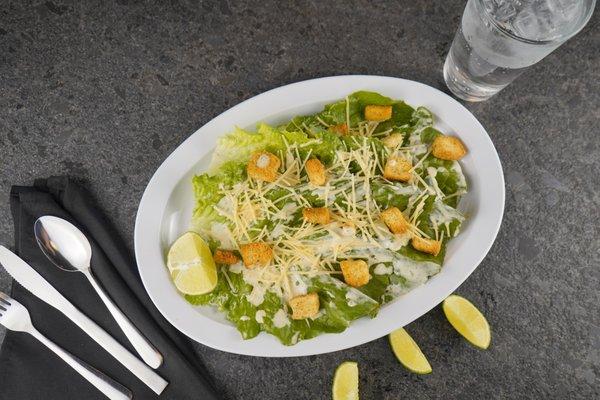 Ceasar salad with home made dressing, croutons and parmesan cheese.