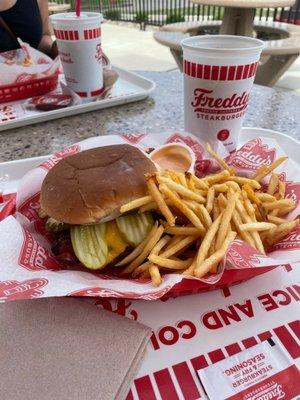 Yummy steak burger and fries with a shake!