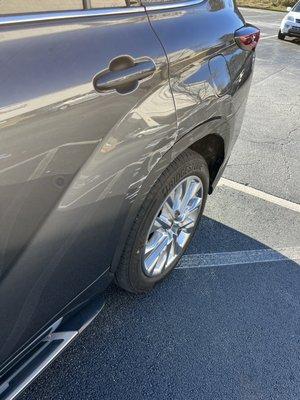 Deep scratch across 2 panels and bumper