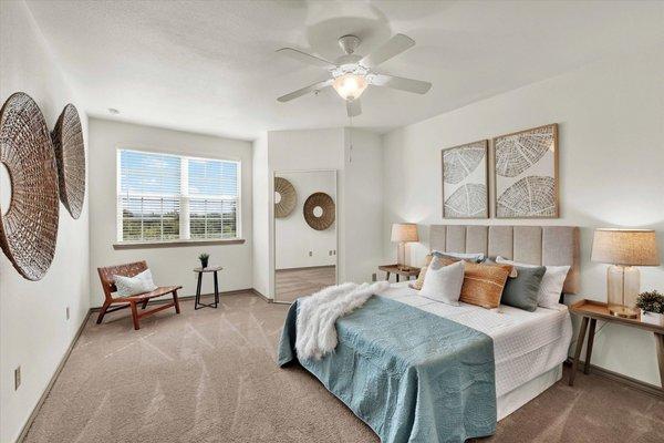 Bedroom with ceiling fan at Villas at Westover Hills