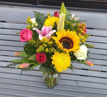 Designer choice flowers with Estrella's Flower Shop.