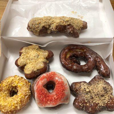 Doughnut assortment at Curiosity Doughnuts