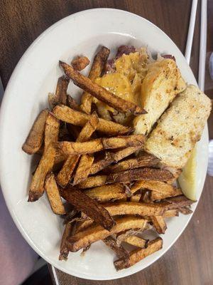 Rueben sandwich with hand cut French fries