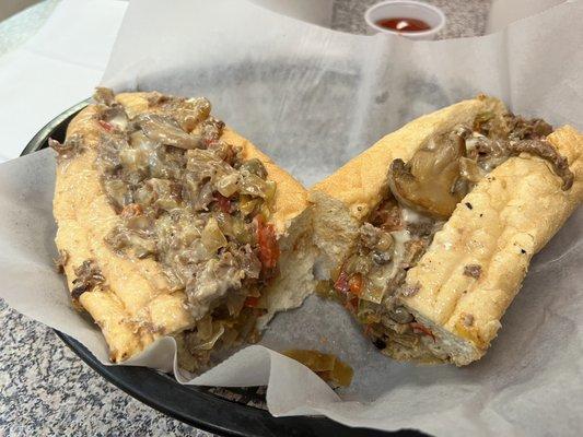 Philly cheese steak w/ onion, pepper, mushrooms and extra cheese.