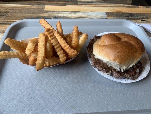 Burger with fries.