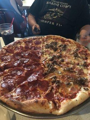 Double pepperoni on half, ham and ground beef on the other half. Super greasy, had to be blotted off on paper towels. 1 waiter 4 whole place