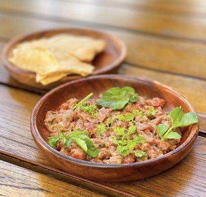 Beef Tartare w/ calabrian chili, cashew, housemade crackers | $18