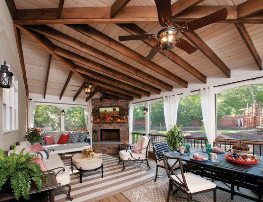 Screened porch with beam ceiling designed and built by Atlanta Decking & Fence.